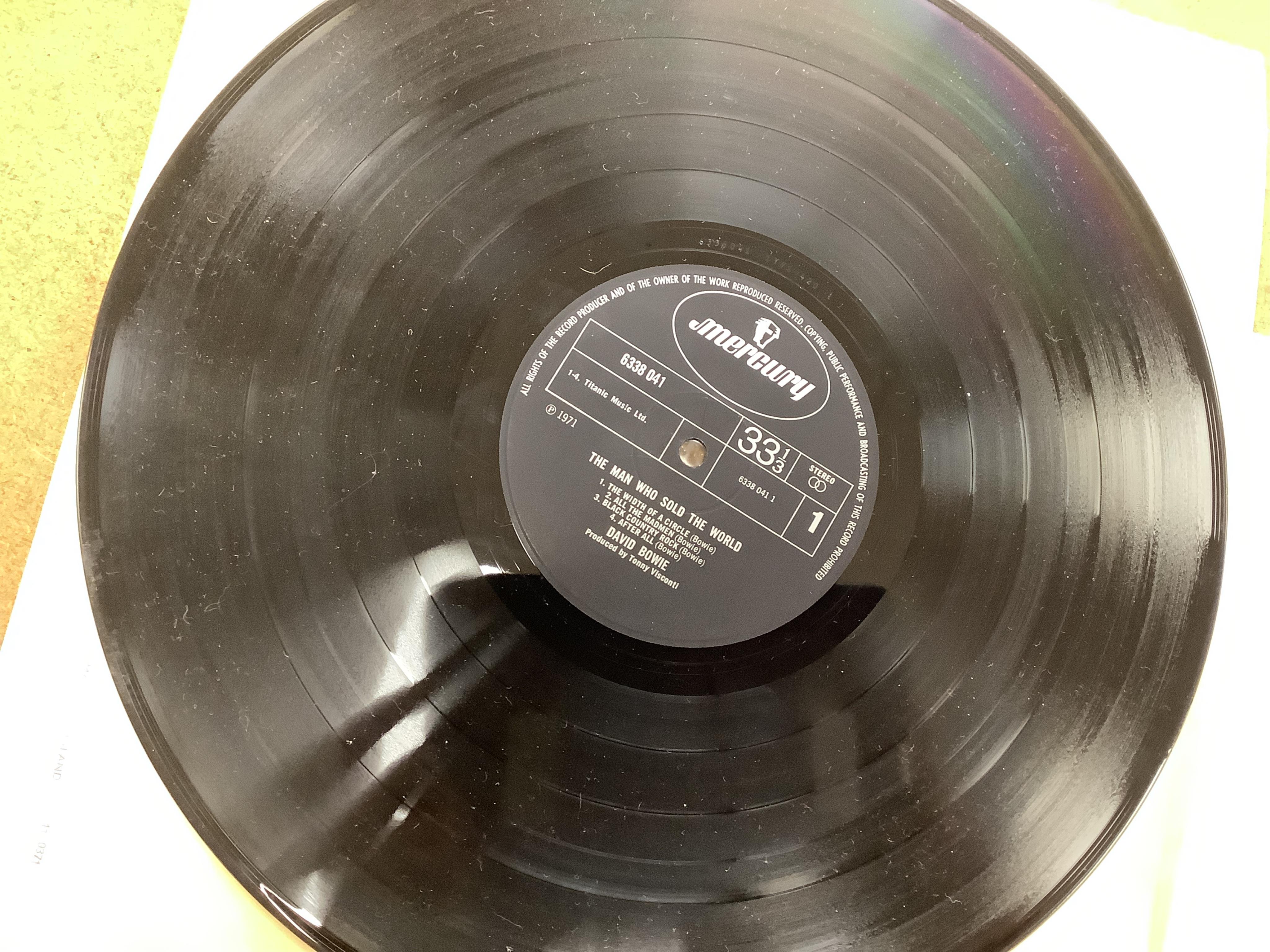 David Bowie, The Man Who Sold the World, 1971 LP record album, on Mercury label, 6338 041, in the scarce cover with Bowie wearing a dress and lying on a chaise lounge